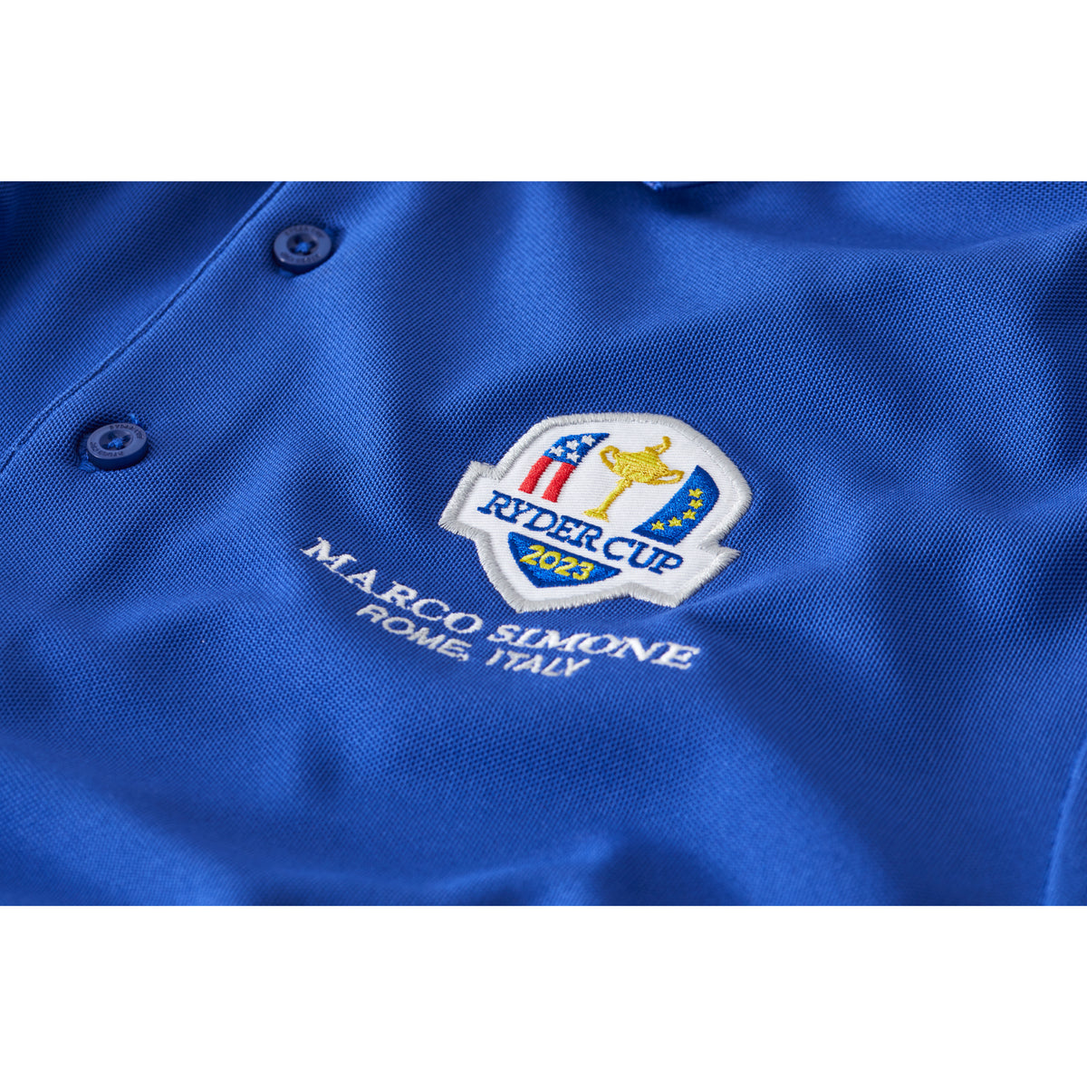 2023 Ryder Cup Rome Collection Men&#39;s Royal Blue Polo Shirt Badge Close-up