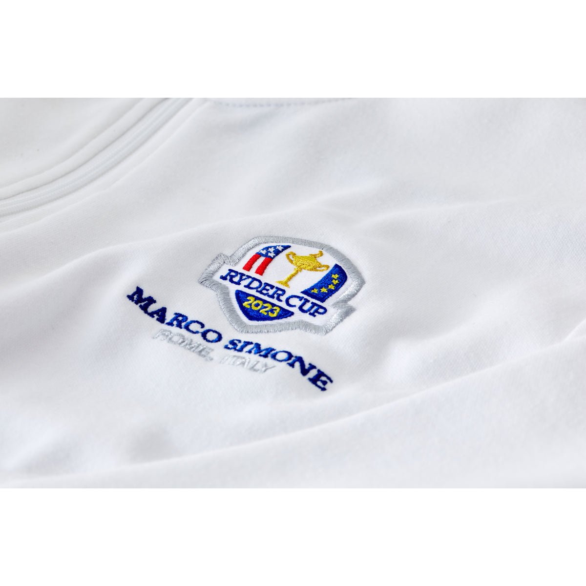 Official 2023 Ryder Cup Rome Collection Men&#39;s White Contrast Panel 1/4 Zip Mid Layer Badge Close-up